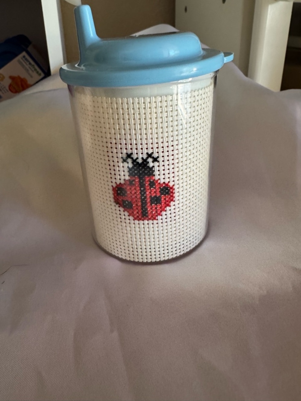 Baby Sippy Cup with Cross-Stitched Ladybug